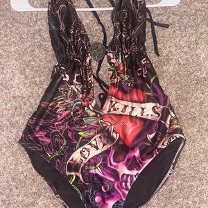 Super cute Ed hardy one piece swimsuit in a size large.